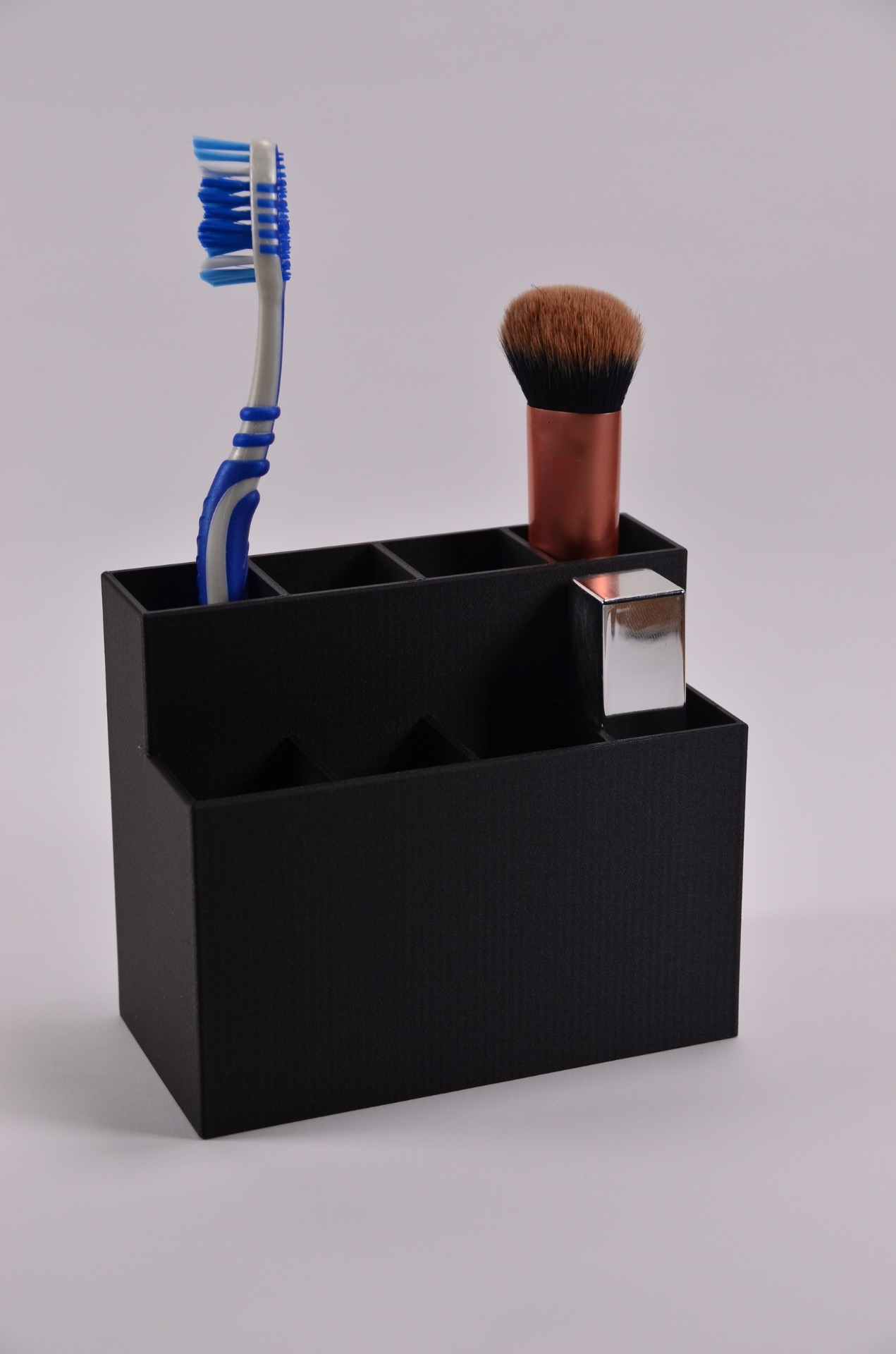 Sorteringsholder med 8 rom - ideell til sminke og tannbørster